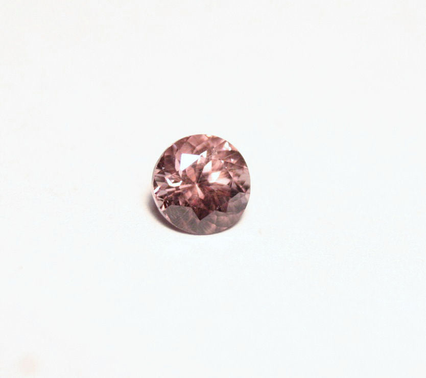 Colour Change Garnet 0.66ct Rare Scintillating Round Cut Fine Gem Tanzania 5x5mm