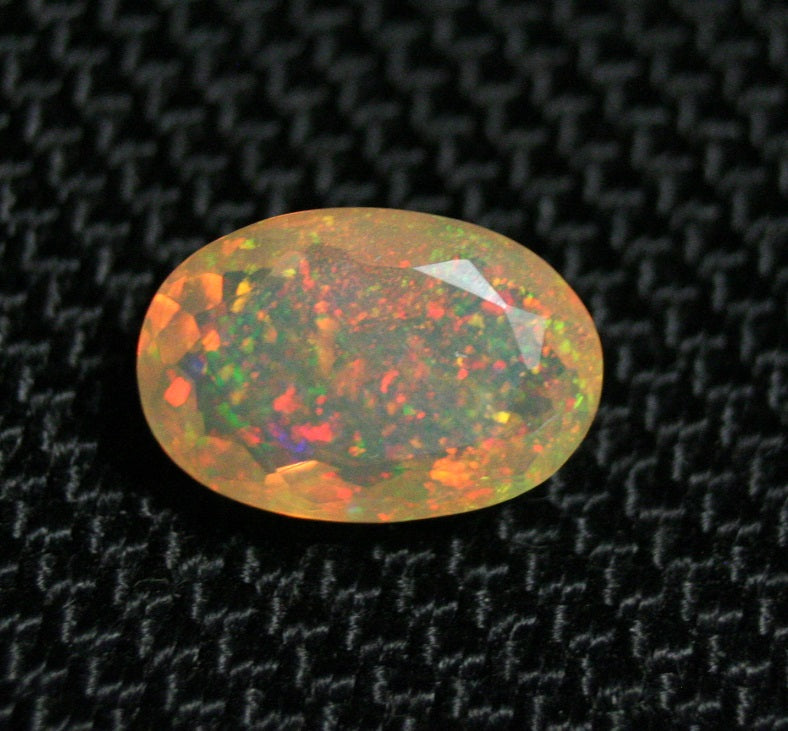 2ct Faceted Welo Opal Rainbow Confetti Oval AAA Natural Crystal Honey Opal 11x8mm - See Video