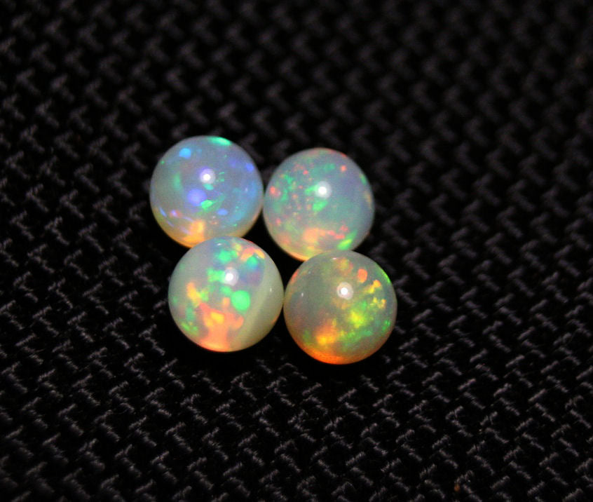 Welo Opal Crystal Ball 4pc Lot 2.34ct Neon Spheres Natural Ethiopian Opal 5x5mm