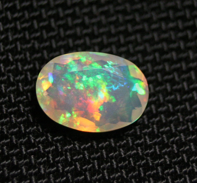 2.26ct Faceted Welo Opal Rainbow Blaze AAA Natural Crystal Jelly Opal 12x9mm - See Video