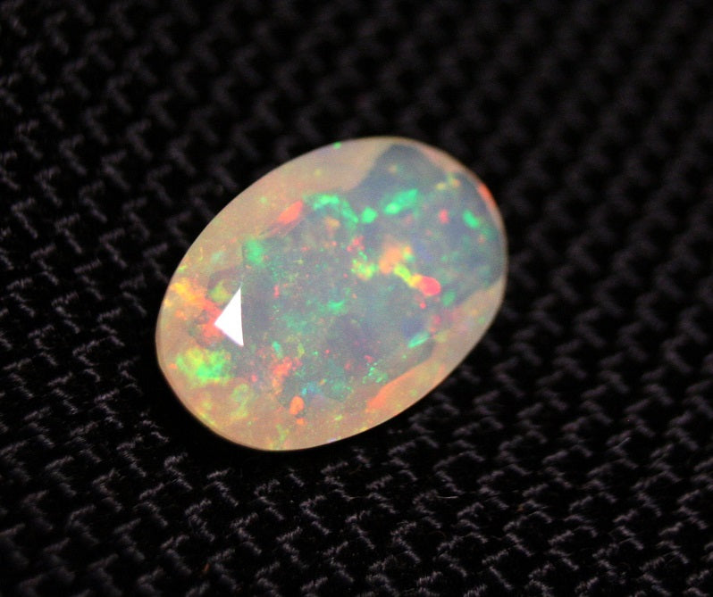 Faceted Welo Opal 2.43ct Neon Oval AAA Natural Crystal Jelly Opal 14x9mm Video