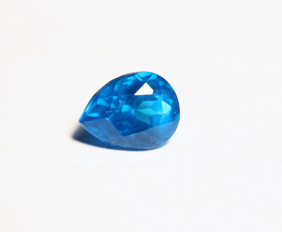 1.06ct Neon Blue Apatite Vibrant Pear Cut Lagoon Blue Gemstone Tanzania 7x6mm