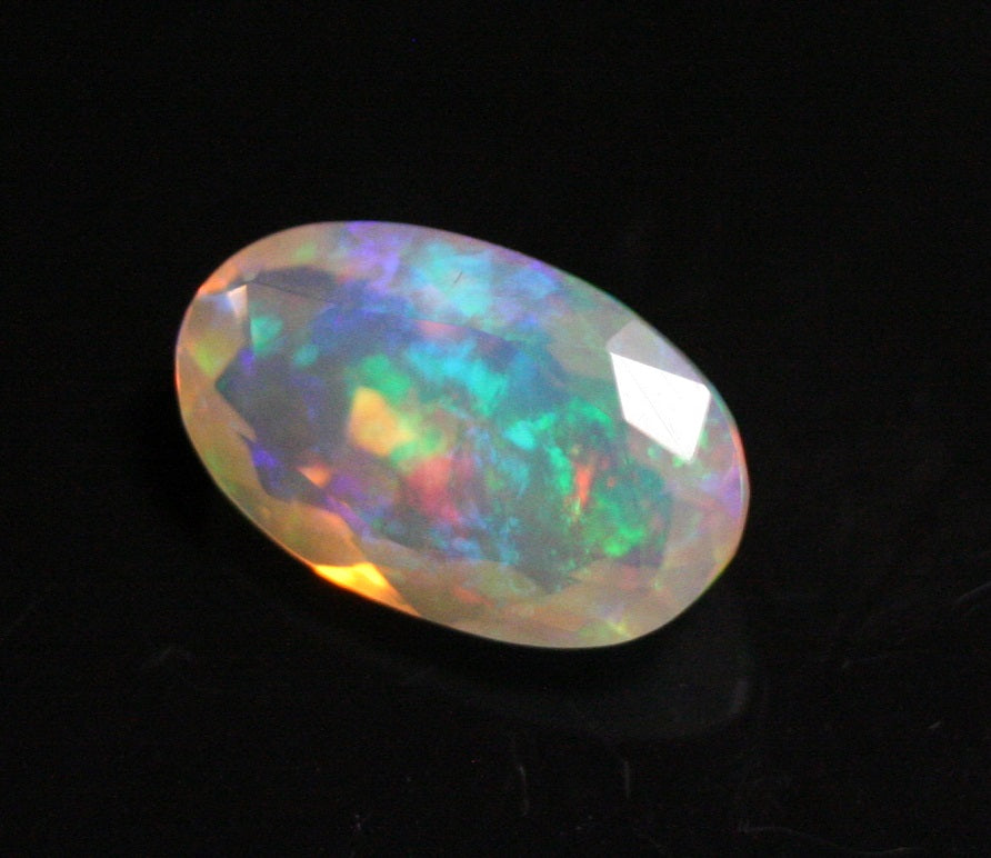 Faceted Welo Opal 2.1ct Rainbow Blaze AAA Natural Crystal Jelly Opal 12x7mm - See Video