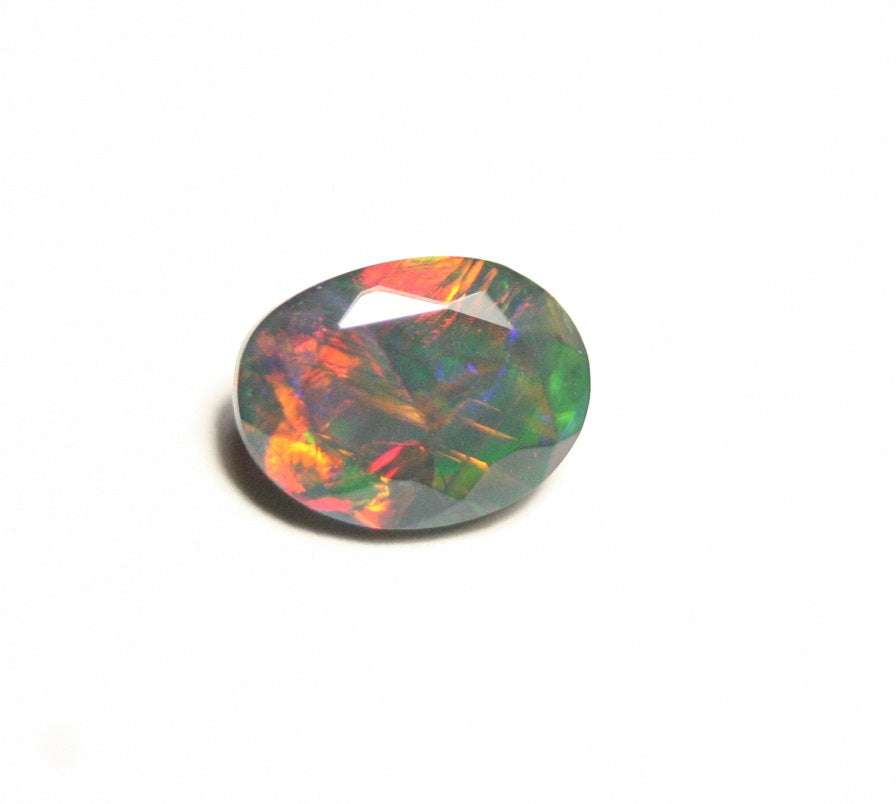 1.24ct Faceted Black Natural Welo Opal Stunning Neon Rainbow AAA Jelly Opal 9x7 clearwatergems