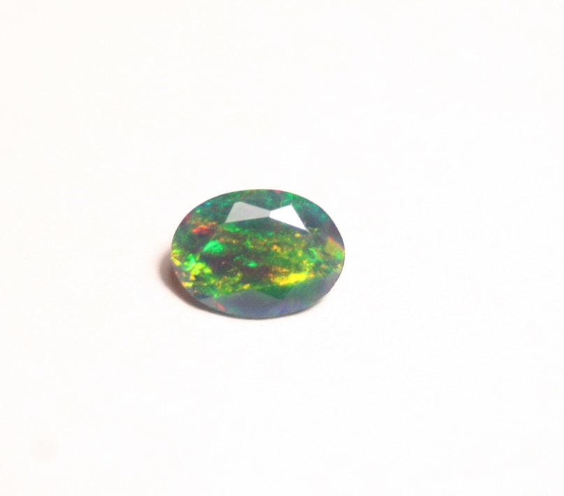 0.7ct Faceted Black Natural Welo Opal Stunning Neon Rainbow Flash AAA Jelly Opal