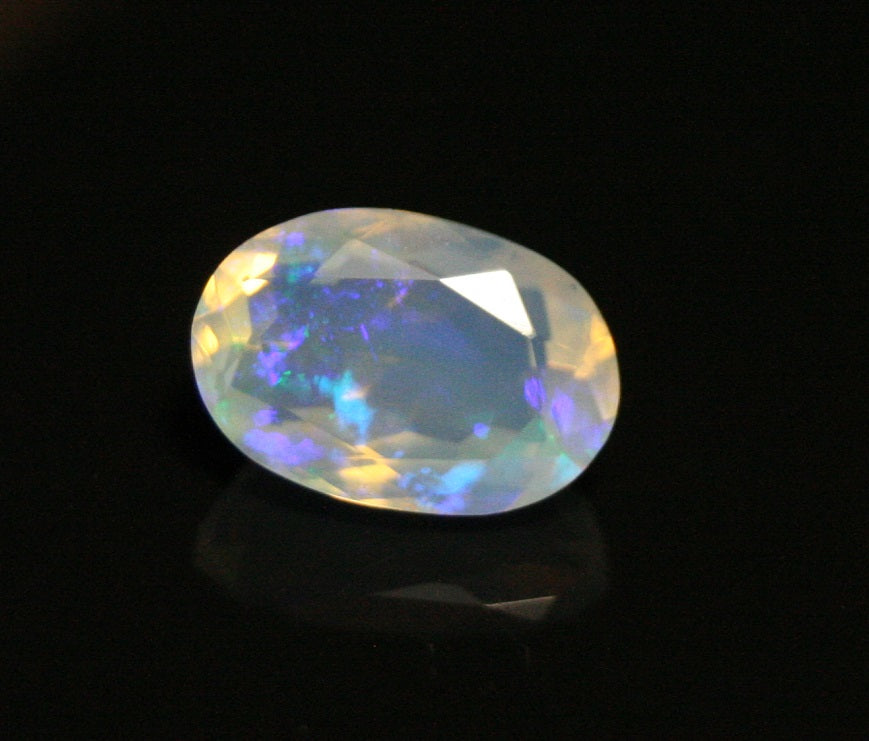 Faceted Welo Opal 1.38ct Neon Violet AAA Natural Crystal Jelly Opal 10x7mm - See Video