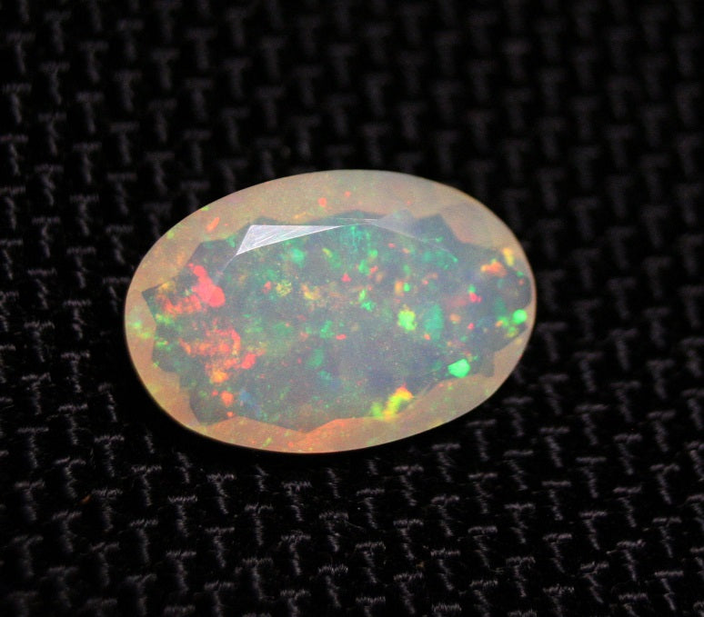 Faceted Welo Opal 2.43ct Neon Oval AAA Natural Crystal Jelly Opal 14x9mm Video