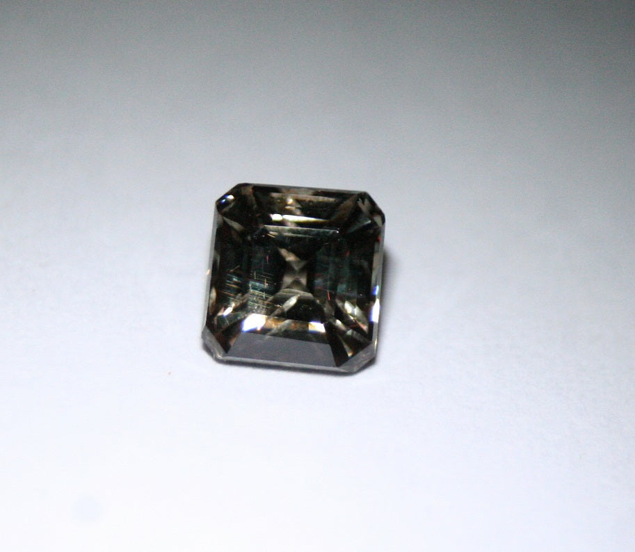 Colour Change Garnet 0.66ct Rare Scintillating Emerald Cut Fine Gem Tanzania 4x4mm