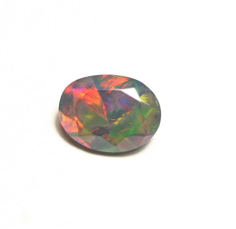 1.24ct Faceted Black Natural Welo Opal Stunning Neon Rainbow AAA Jelly Opal 9x7 clearwatergems