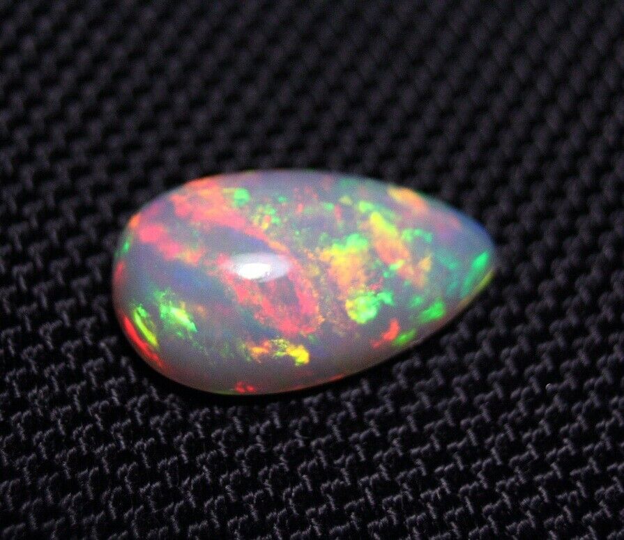 7.9ct Welo Grey Base Opal Cabochon Rainbow Blaze AAA Natural Opal See Video